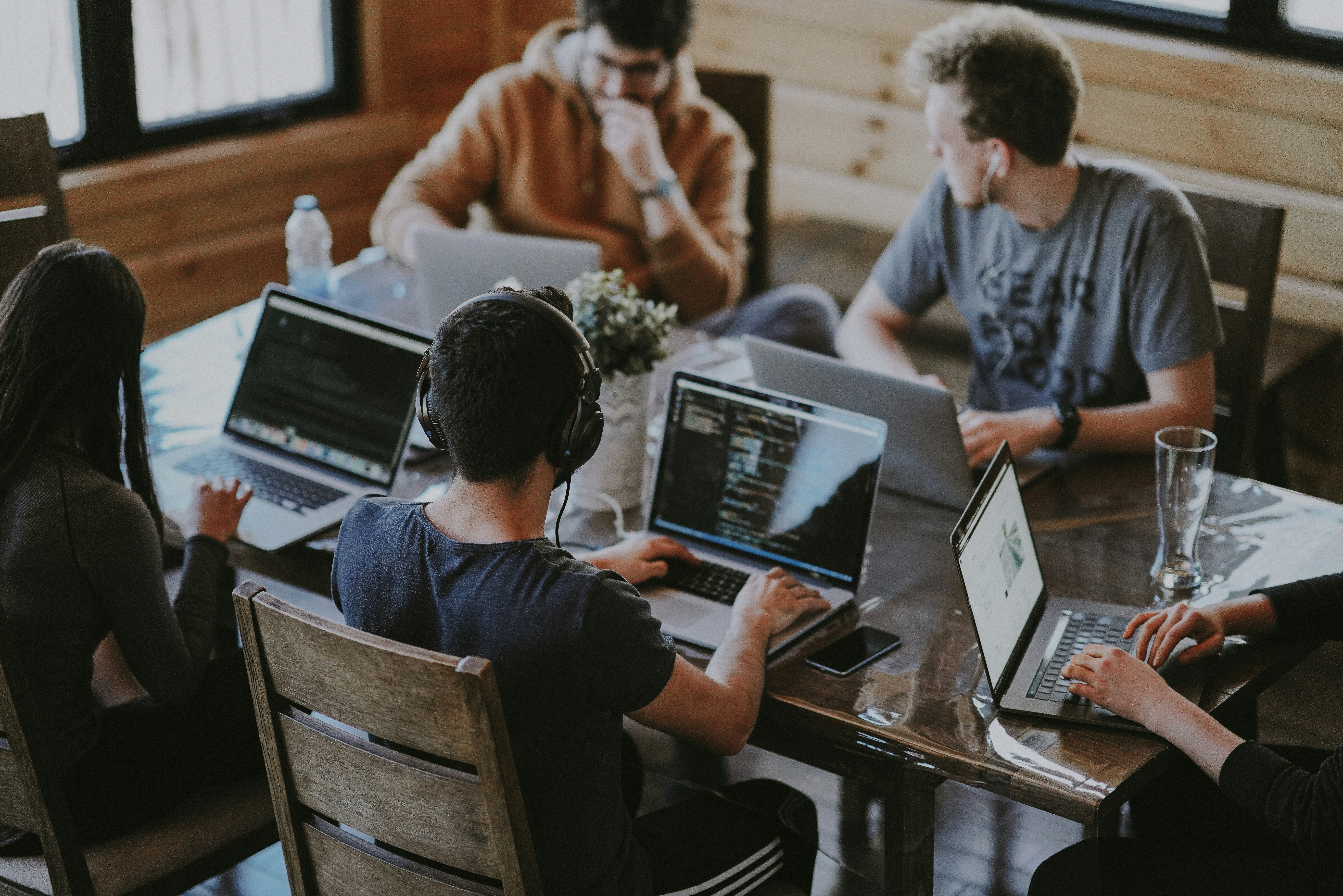 A grouped of people collaborating on a project together